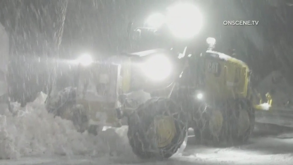 Cars get stuck in the snow on Highway 18